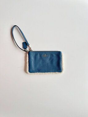 COACH Slate Blue Pebbled Leather Shearling Trimmed Wristlet Clutch
